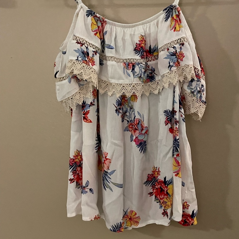 Only worn once. Very cute with a pair of shorts or jeans!
